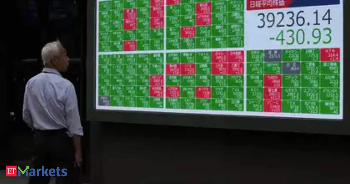 Japan's Topix hits record high, yen falls as PM Ishiba resigns